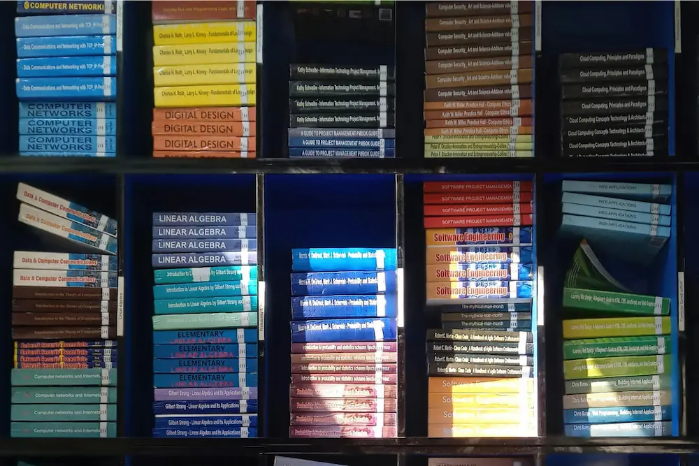 Books arranged by color. 8 Modern Home Library Design Ideas for 2026.